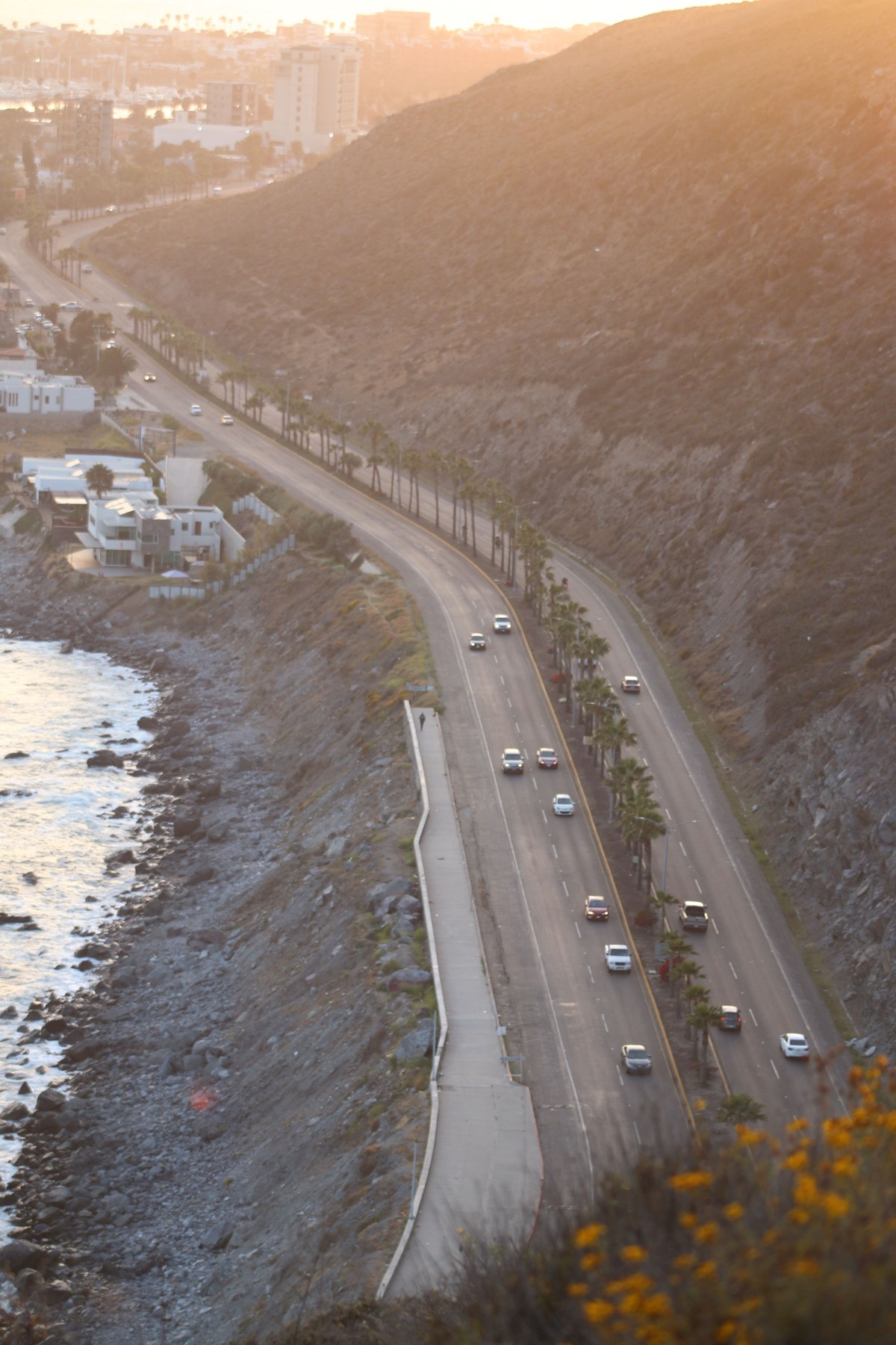 Coastal highway in Ensenada, Mexico, at sunset